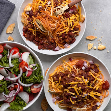Cincinnati Spaghetti 🍝A healthier, meatless version of Cincy's classic chili. This regional recipe is full of flavor, protein and fiber. Beans and lentils simmered in a  robust, earthy tomato sauce with Cincinnati's unique spices served on top of hot spaghetti with cheese is a delicious, comforting dinner that you and your family will love.